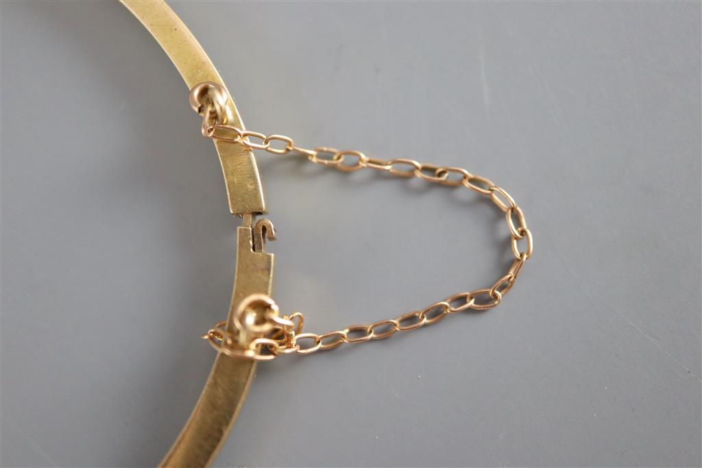 An Edwardian gold, ruby, old and rose cut diamond set hinged bracelet,